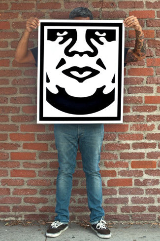 Person holding a third OBEY 3-FACE (White) Signed Lithograph Set